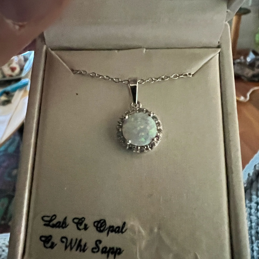 Radiant Gem opal necklace with diamond accents 18” chain. Sterling Silver